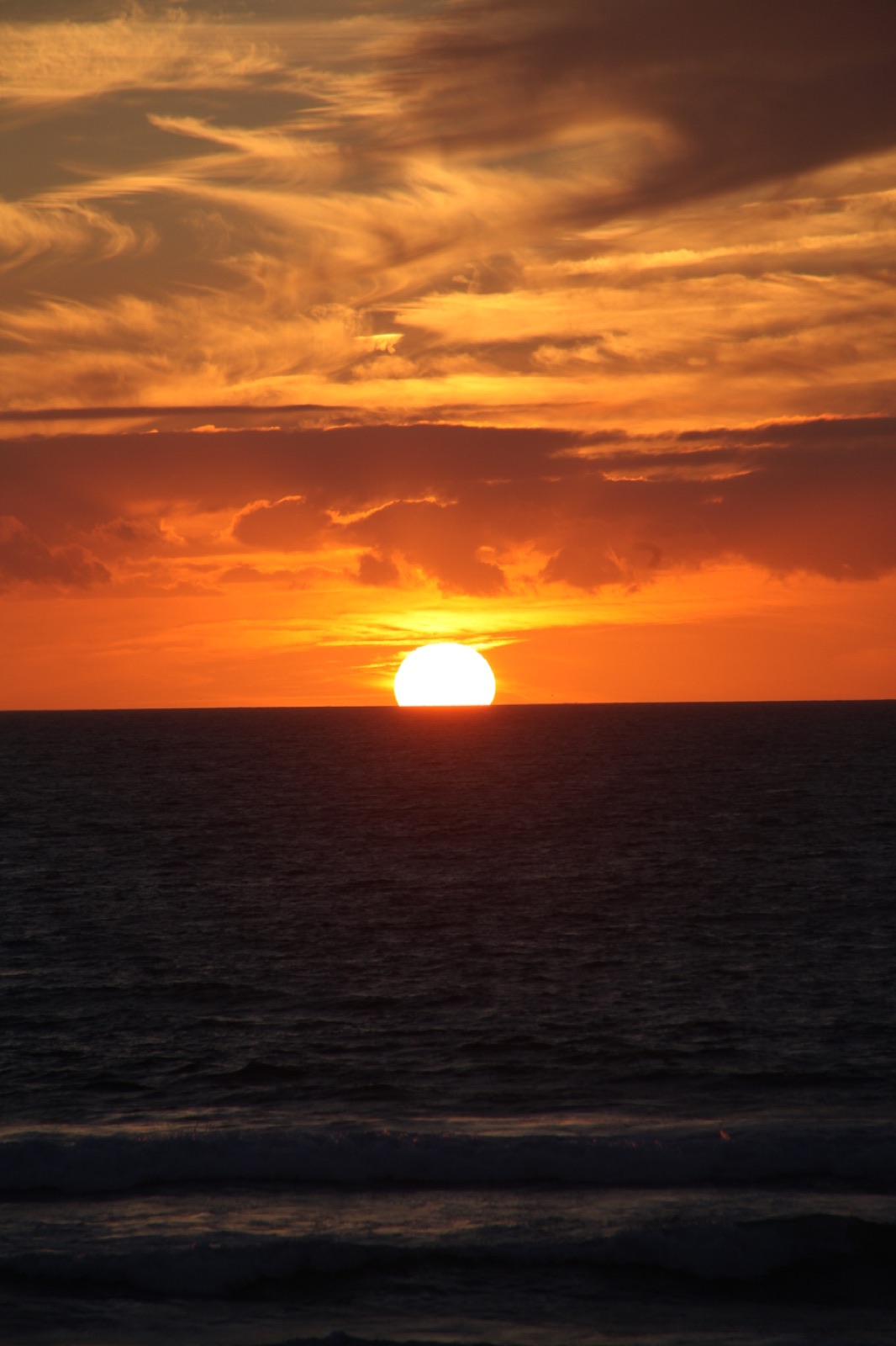 An orange sunset over the sea